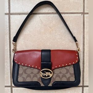 Coach bag. Long straps and shoulder straps